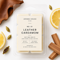 Leather Cardamom soy wax melts by Aroma House Miami, 3 oz clamshell surrounded by leather, sandalwood, vetiver