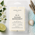 Ocean Bergamot soy wax melts by Aroma House Miami, 3 oz clamshell surrounded by lemon, jasmine, musk