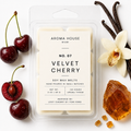 Velvet Cherry soy wax melts by Aroma House Miami, 3 oz clamshell surrounded by floral, vanilla, amber