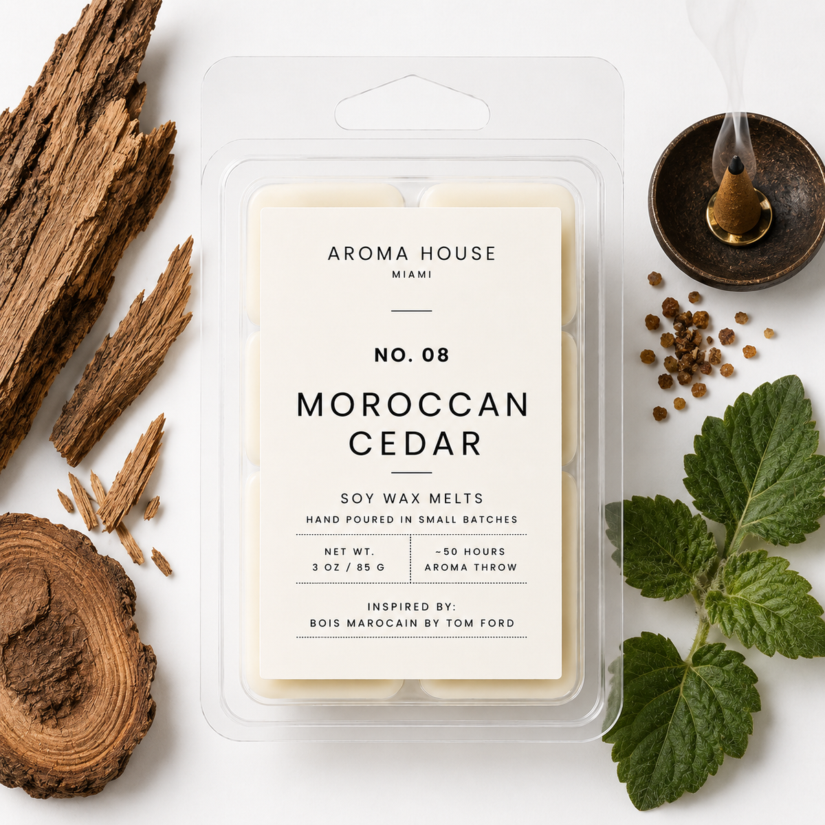 Moroccan Cedar soy wax melts by Aroma House Miami, 3 oz clamshell surrounded by vetiver, resin, spice