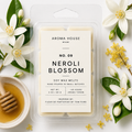 Neroli Blossom soy wax melts by Aroma House Miami, 3 oz clamshell surrounded by citruses, black locust, honey