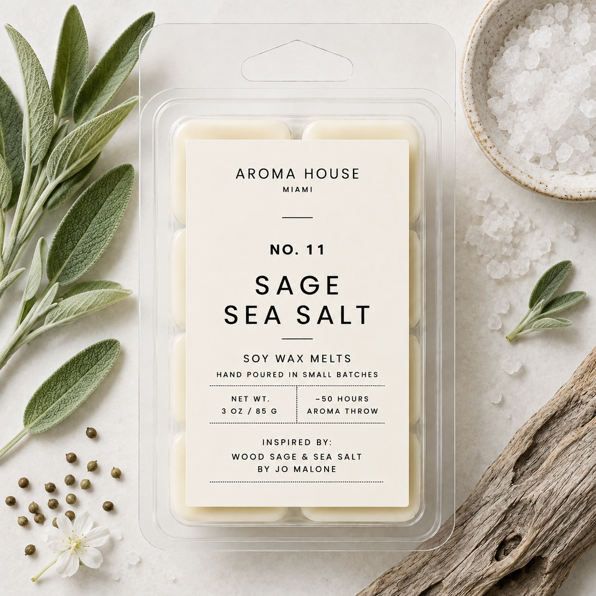 Sage Sea Salt soy wax melts by Aroma House Miami, 3 oz clamshell surrounded by sage, sea salt, ambrette seed