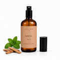 Santal room and linen spray by Aroma House Miami, 3.4 fl oz amber glass bottle with cardamom, iris, violet notes