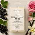 Blackcurrant Rose soy wax melts by Aroma House Miami, 3 oz clamshell surrounded by blackcurrant leaf, blackcurrant fruit, vanilla
