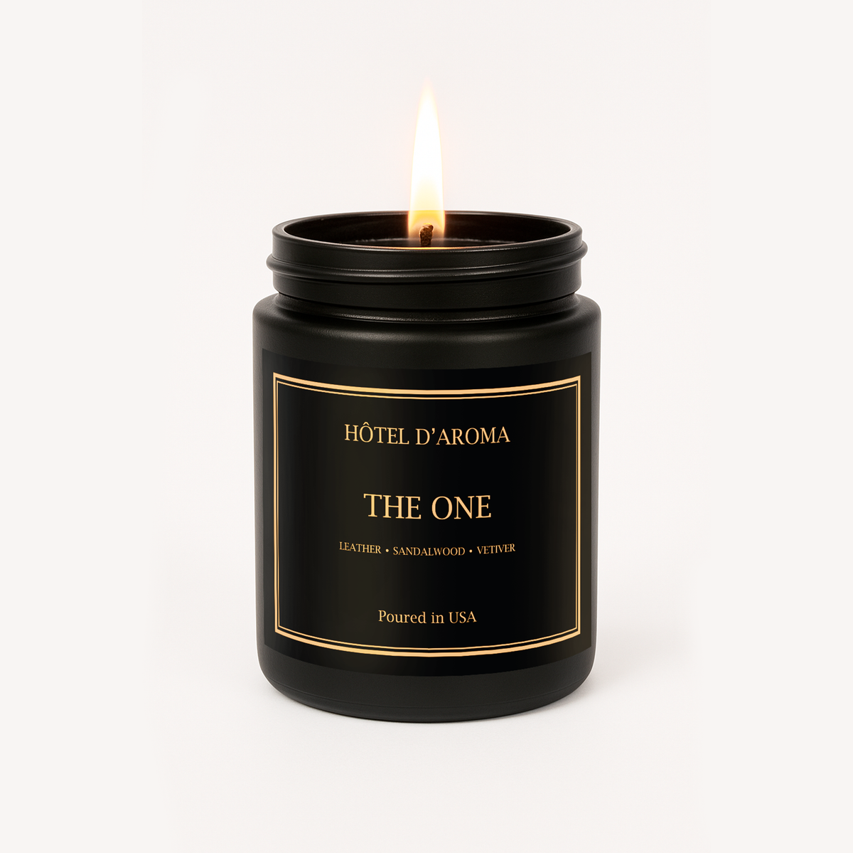 The One 9 oz soy wax candle in matte black jar, Hôtel d'Aroma collection by Aroma House Miami, leather, sandalwood, vetiver